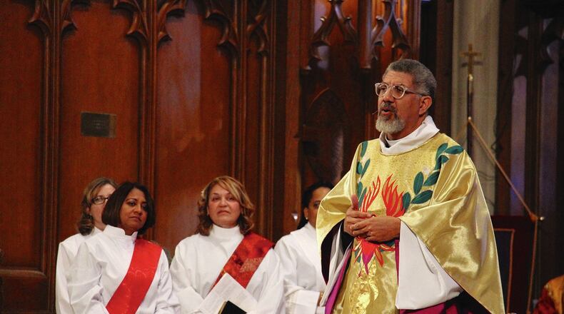 Robert C. Wright, the bishop of the Episcopal Diocese of Atlanta, during the ordination ceremony. The diocese will keep services online for now.