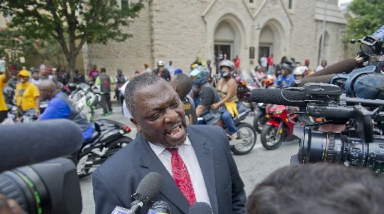 The Rev. Samuel Mosteller, photographed at a 2013 rally at the Georgia State Capitol, on Tuesday advocated African-American families arm themselves in response to recent police shootings of unarmed black men. JONATHAN PHILLIPS / SPECIAL