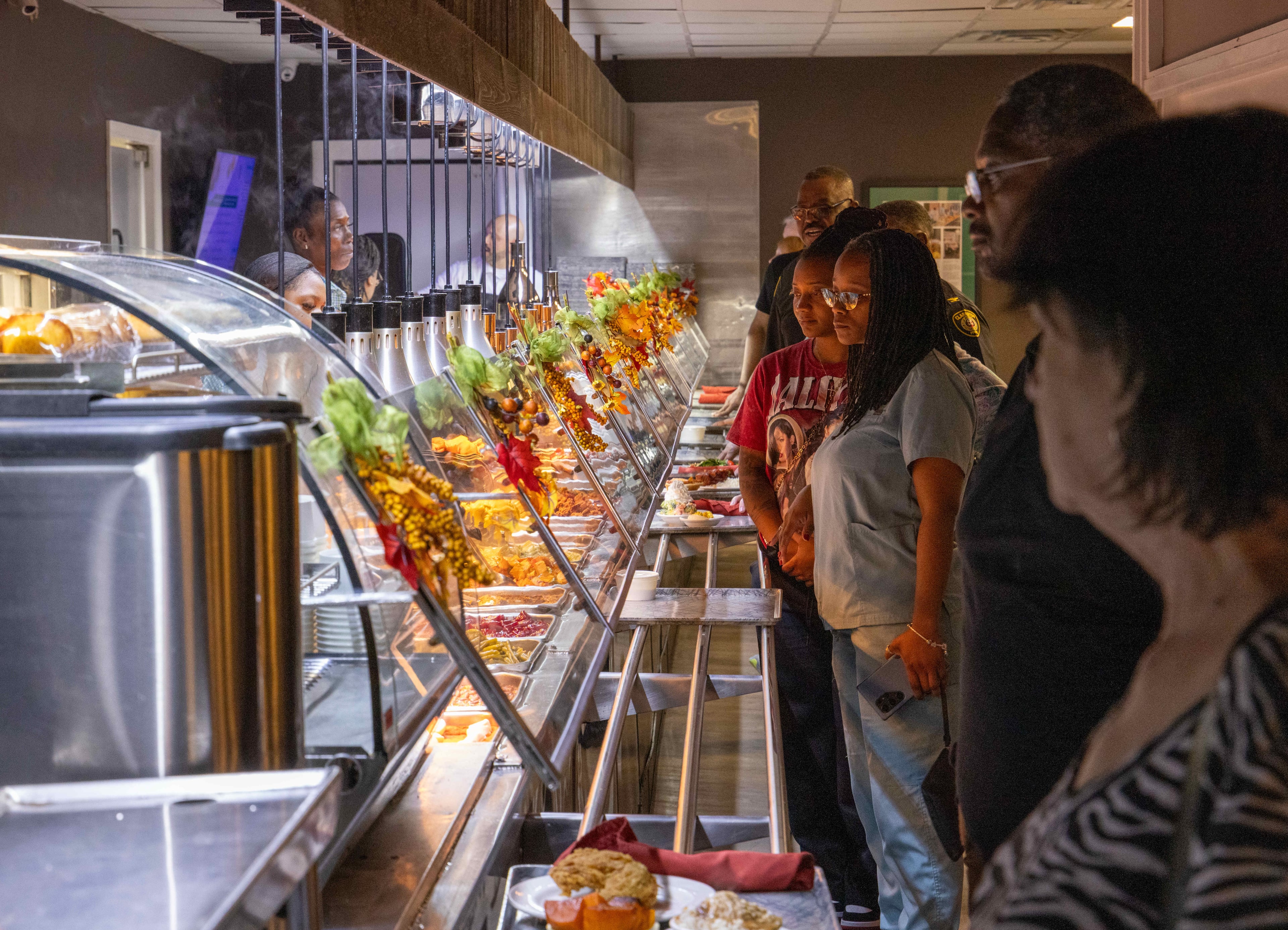 The cafeteria line itself — gleaming steel, heaping plates of meats, salads, vegetables, breads and desserts — is part of the appeal. (Phil Skinner for the AJC)