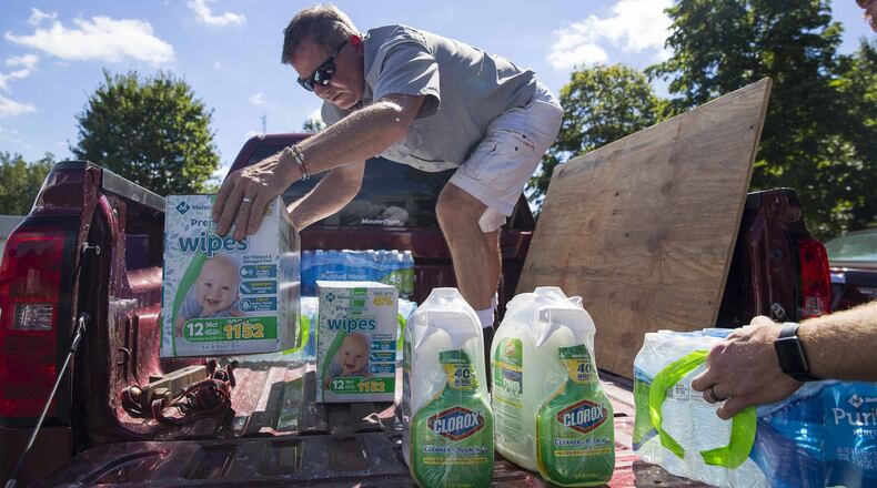 Similar to past hurricane support efforts, Milton Police will join the “Convoy of Care” to help those affected by Hurricane Ida. Donations of household cleaning supplies, batteries, box fans and more can be made at Milton Police headquarters 9 a.m. to 5 p.m. weekdays through 10 a.m. Sept. 14. (ALYSSA POINTER/ALYSSA.POINTER@AJC.COM)