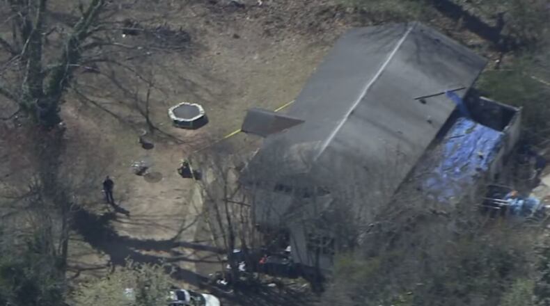 The child was shot at a home on Robin Hood Lane in Henry County, police said.