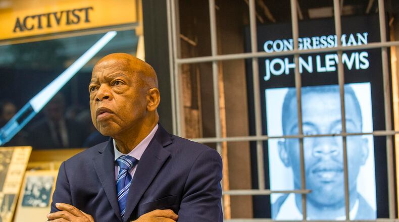 U.S. Congressman John Lewis (D-GA) poses for a portrait in front of his newly unveiled art exhibit "John Lewis-Good Trouble" in the atrium of the domestic terminal at Atlanta's Hartsfield Jackson International Airport, on April 8, 2019. (Alyssa Pointer/Atlanta Journal-Constitution/TNS)