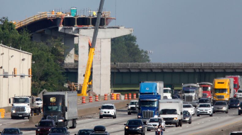 View of the express lane bridge over the Canton Road Connector. I-75 southbound is in the foreground. The Northwest Corridor express lanes project is under active construction, and is expected to open in 2018. BOB ANDRES / BANDRES@AJC.COM