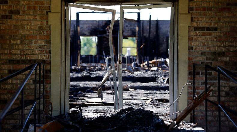 The burnt ruins of the Greater Union Baptist Church, one of three that recently burned down in St. Landry Parish, are seen in Opelousas, La., Wednesday, April 10, 2019.