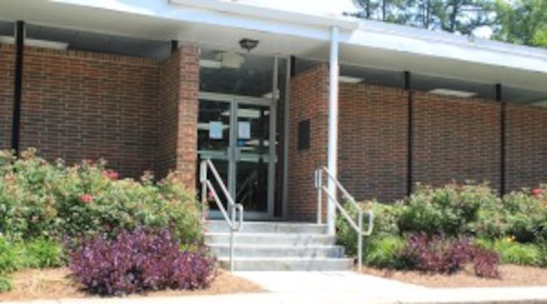 The 50-year-old Lewis A. Ray library branch, 4500 Oakdale Road, Smyrna will be developed as community green space and moved to the new retail development of West Village. Courtesy of Cobb County