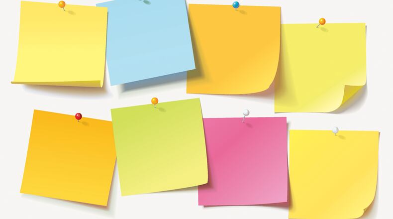 Post-it notes, like this photo illustration, have been left around the city of Milwaukee to spread good thoughts to complete strangers.