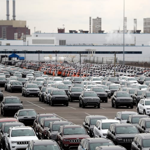 FILE - In this Feb. 26, 2019, file photo, Jeep vehicles are parked outside the Jefferson North Assembly Plant in Detroit. (AP Photo/Carlos Osorio, File)