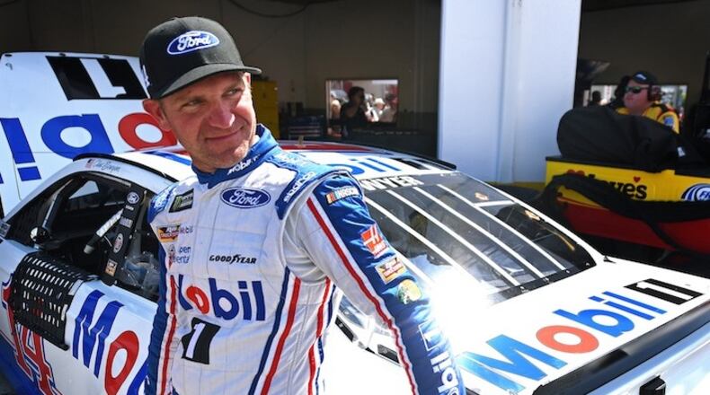 NASCAR driver Clint Bowyer relaxes next to his car following the final practice for the Daytona 500 on February 25, 2017, at Daytona International Speedway in Daytona Beach, Fla. (Jeff Siner/Charlotte Observer/TNS)