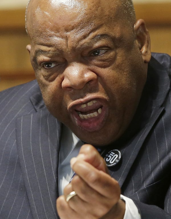 FILE - U.S. Rep. John Lewis, D-Ga., addresses a gathering at the 16th Street Baptist Church in Birmingham, Ala., Sept. 13, 2013. (AP Photo/Dave Martin, file)