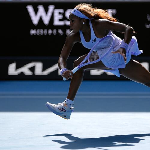 Coco Gauff of the U.S. plays a backhand return to Karolina Muchova of the Czech Republic during their fourth round match at the Australian Open tennis championship in Melbourne, Australia, Sunday, Jan. 25, 2026. (AP Photo/Asanka Brendon Ratnayake)