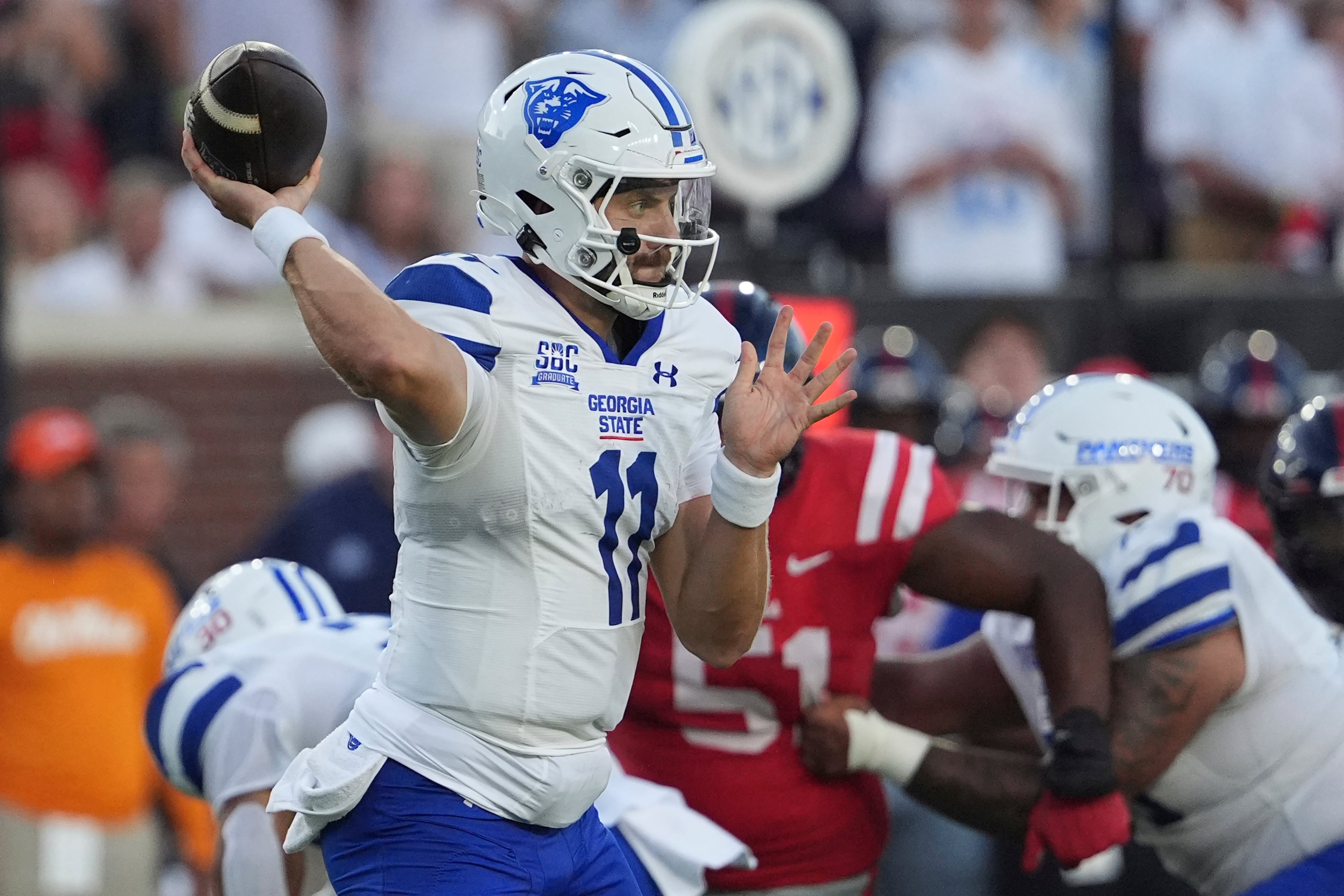 Georgia State quarterback Christian Veilleux attempts a pass against Mississippi on Saturday, Aug. 30, 2025, in Oxford, Miss. The arrival this week of a new transfer has added another layer of intrigue as the Panthers prepare for Saturday’s home opener against Memphis. (Rogelio V. Solis/AP)