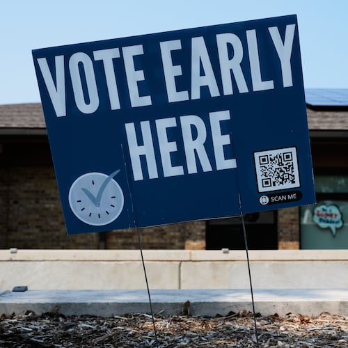 A voter walks to polling place in Milwaukee, Tuesday, July 28, 2026. (AP Photo/Nam Y. Huh)