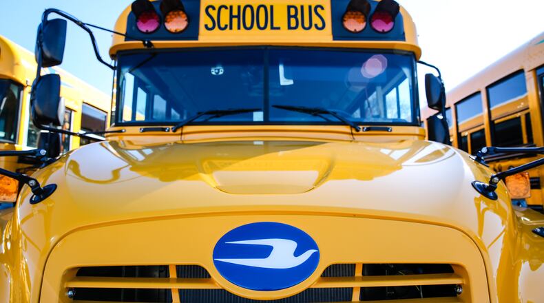 Henry County Schools on Tuesday broke ground on a new transportation facility for its school buses. (Jenni Girtman for The Atlanta Journal-Constitution)