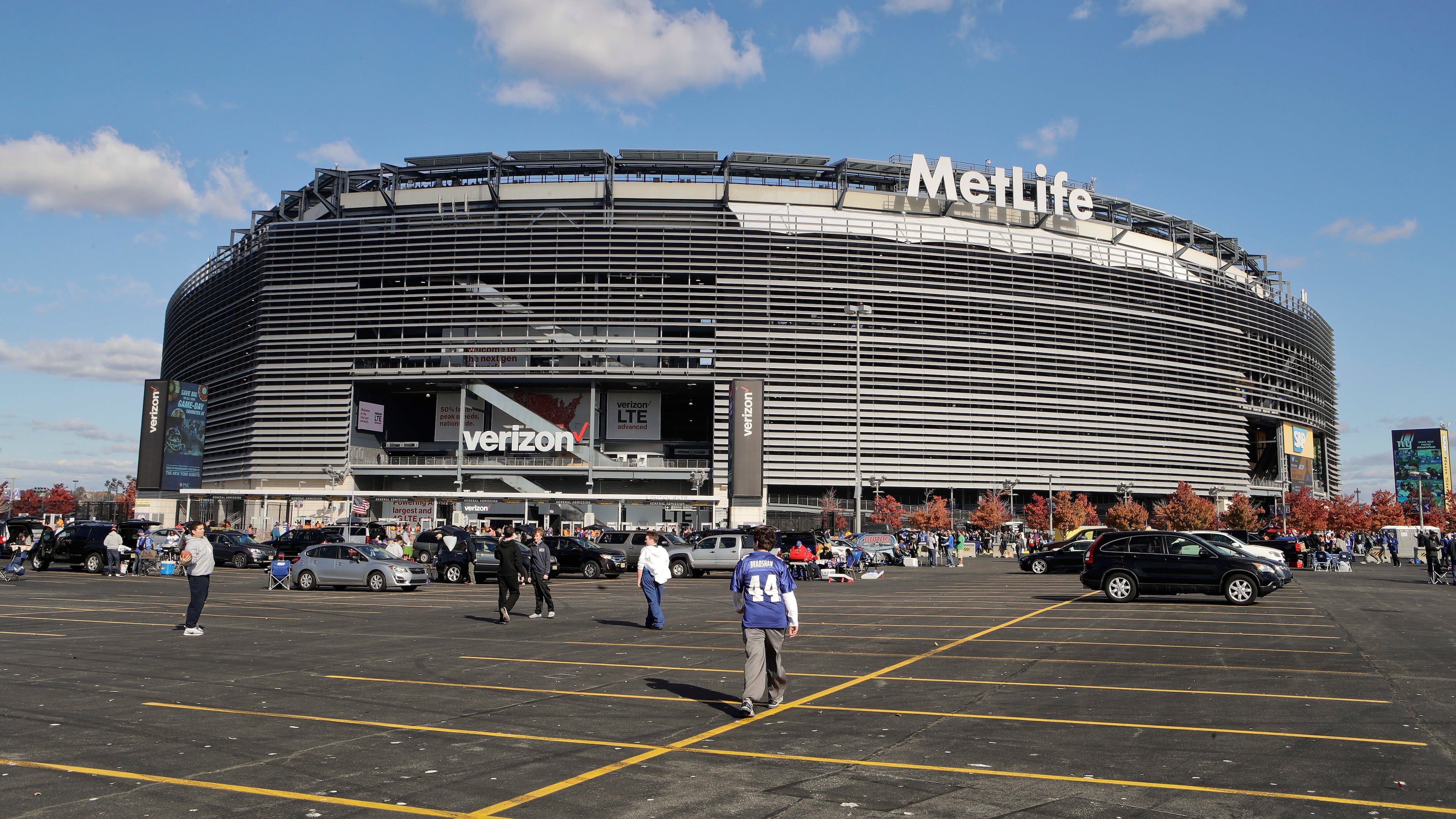 FILE - Tailgaters gather outside MetLife Stadium before an NFL football game between the New York Giants and the Philadelphia Eagles, Sunday, Nov. 6, 2016, in East Rutherford, N.J. (AP Photo/Frank Franklin II, File)