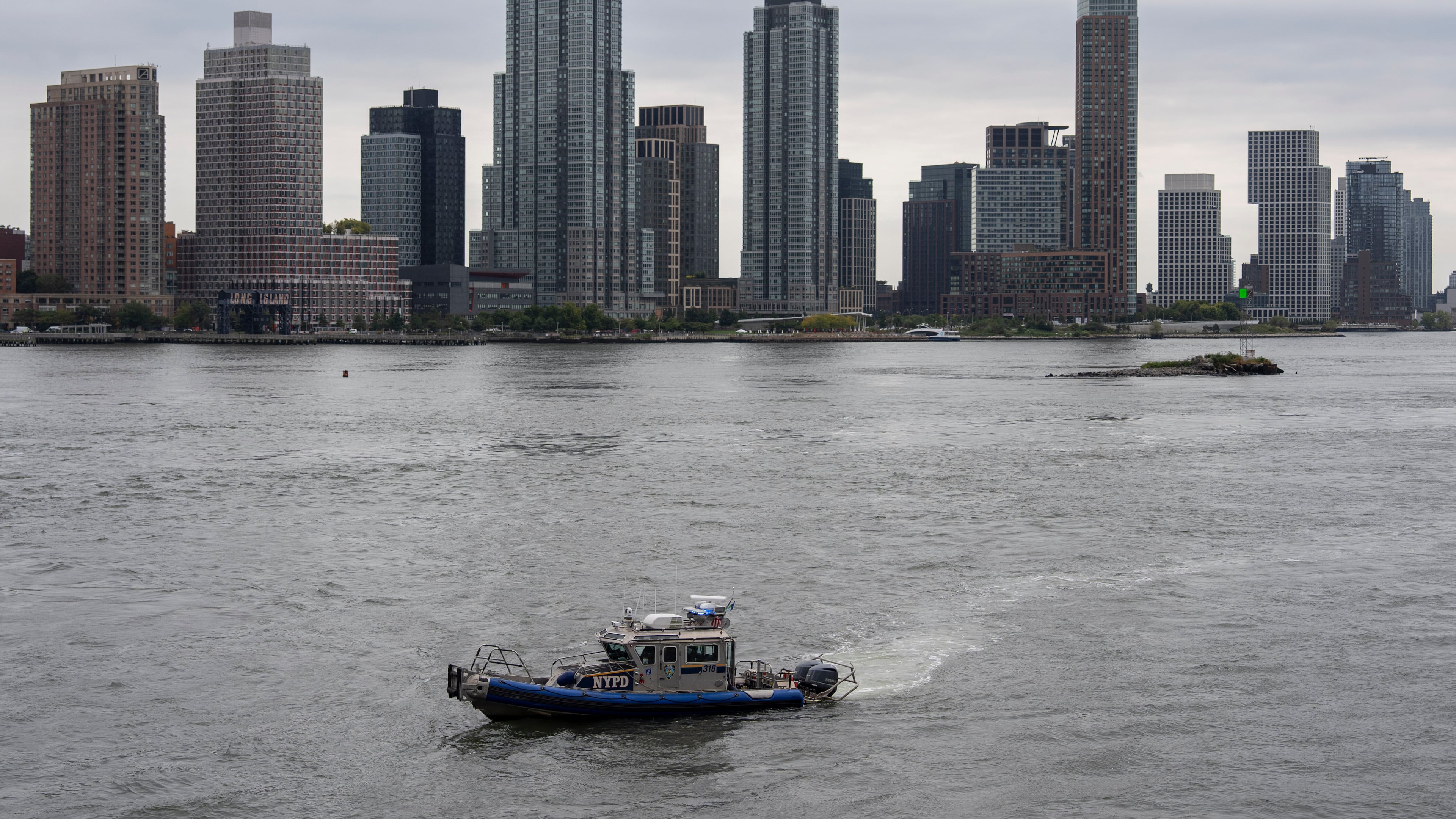 US Coast Guard boat float on the East River near the United Nations Headquarters in New York, Monday, Sept. 22, 2025. (AP Photo/Yuki Iwamura)