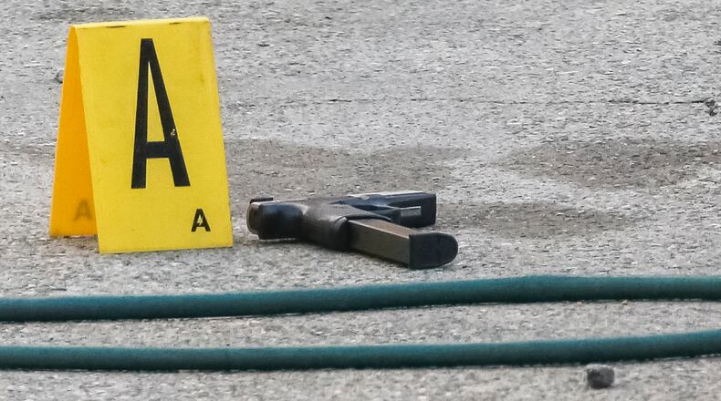 JOHN SPINK /JSPINK@AJC.COM