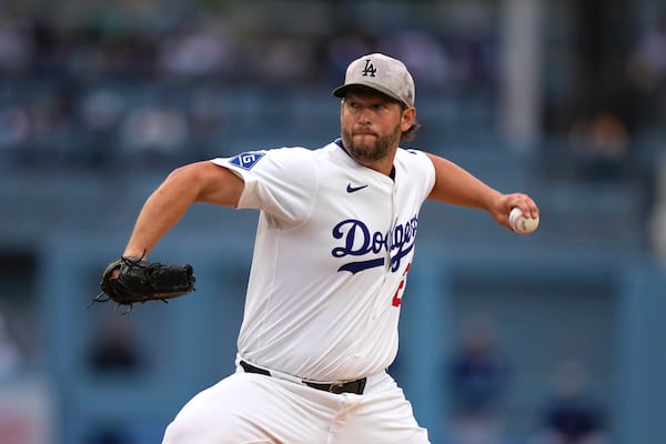 Los Angeles Dodgers starting pitcher Clayton Kershaw throws to the plate during the first inning of a baseball game against the Los Angeles Angels, Saturday, May 17, 2025, in Los Angeles. (AP Photo/Mark J. Terrill)