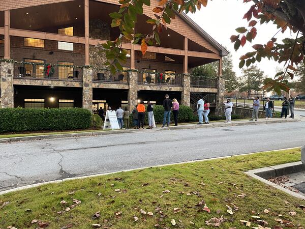 Voters lined up at the Merle Manders Conference Center in Stockbridge on Tuesday.