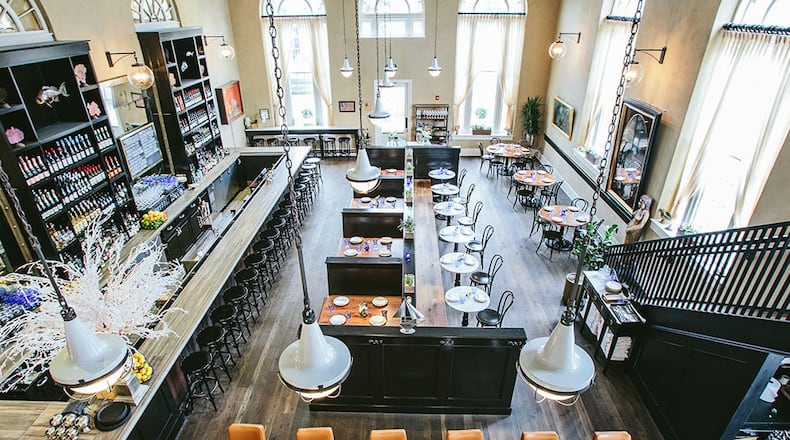 Enjoy a seafood dinner on the second floor of The Ordinary, overlooking the grand dining room and oyster raw bar.