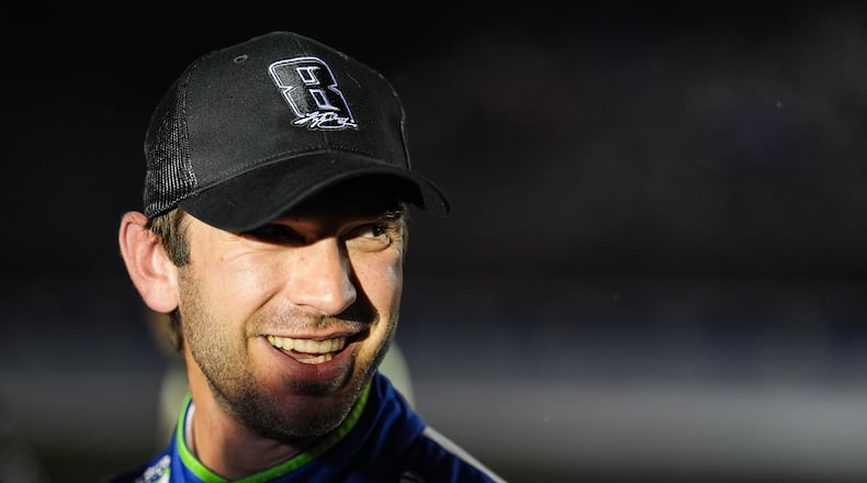 Daniel Suarez smiles after winning a NASCAR Cup Series auto race, Sunday, May 24, 2026, in Charlotte, N.C. (AP Photo/Matt Kelley)