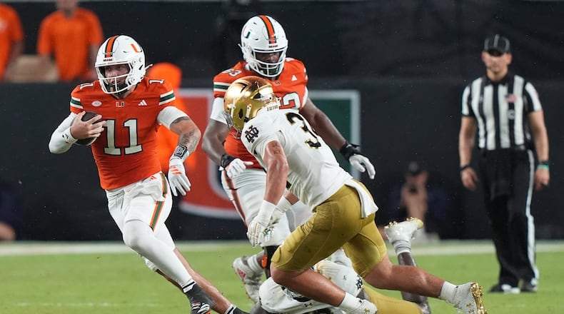 Miami's ability to reach the CFP championship game as the last at-large team to make the field and Notre Dame's controversial exclusion from the 12-team field last year has influenced ACC commissioner Jim Phillips to get behind a 24-team field. (Lynne Sladky/AP)