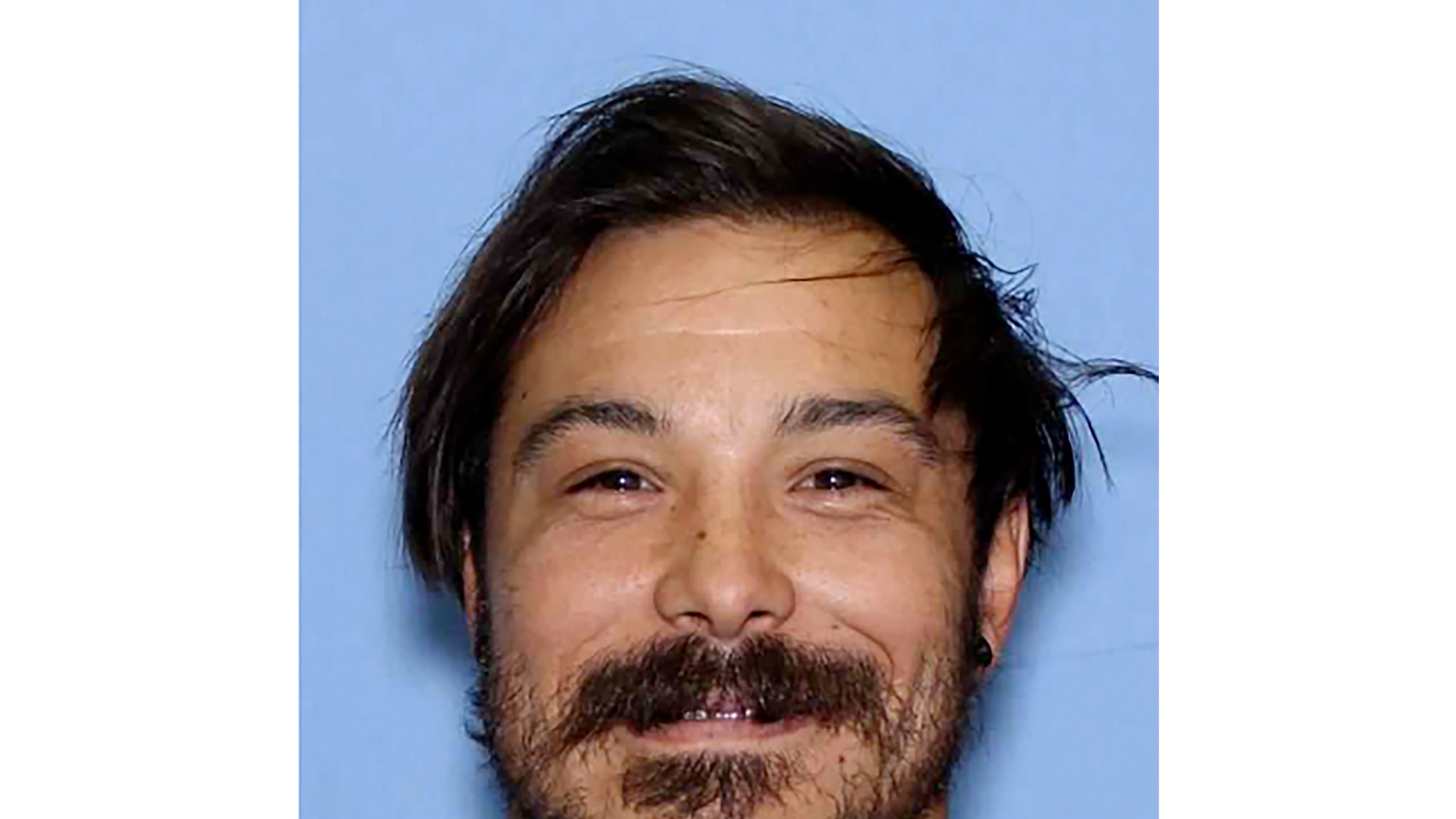 FILE - This undated photo provided by the Wenatchee Police Department shows Travis Caleb Decker, who is wanted in connection with the deaths of his three daughters. (Wenatchee Police Department via AP, File)
