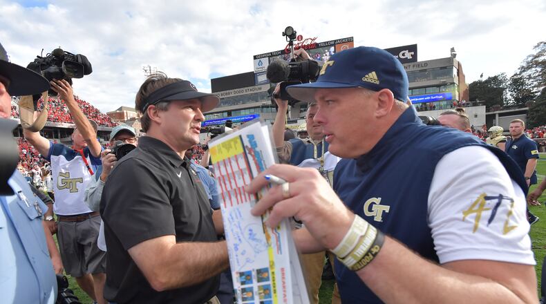 Georgia head coach Kirby Smart and Georgia Tech head coach Geoff Collins shake hands during an NCAA college football game at Bobby Dodd Stadium on Saturday, November 30, 2019. Georgia won 52-7 over the Georgia Tech. (Hyosub Shin / Hyosub.Shin@ajc.com)