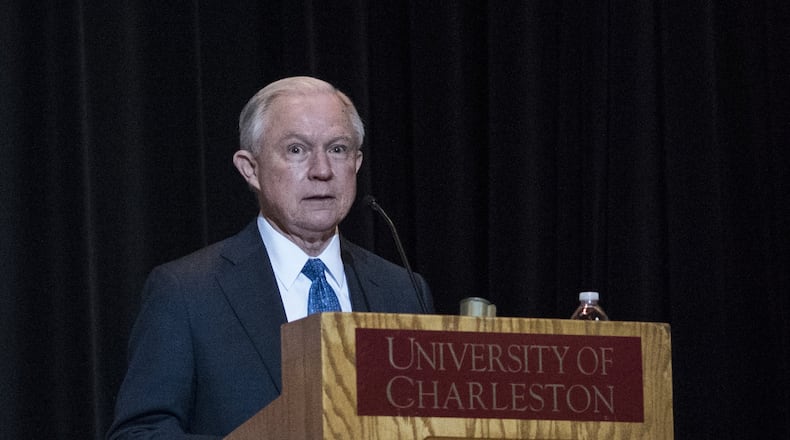 Attorney General Jeff Sessions addresses the crowd with opening remarks during a Drug Enforcement Administration (DEA) 360 Heroin and Opioid Response Summit at the University of Charleston on Thursday, May 11, 2017, in Charleston, W.Va. The event, which was sponsored by the DEA, Community Anti-Drug Coalitions of America and the University of Charleston School of Pharmacy, was held to provide solutions and strategies for combating the heroin and prescription drug abuse epidemic. (AP Photo/Sam Owens)