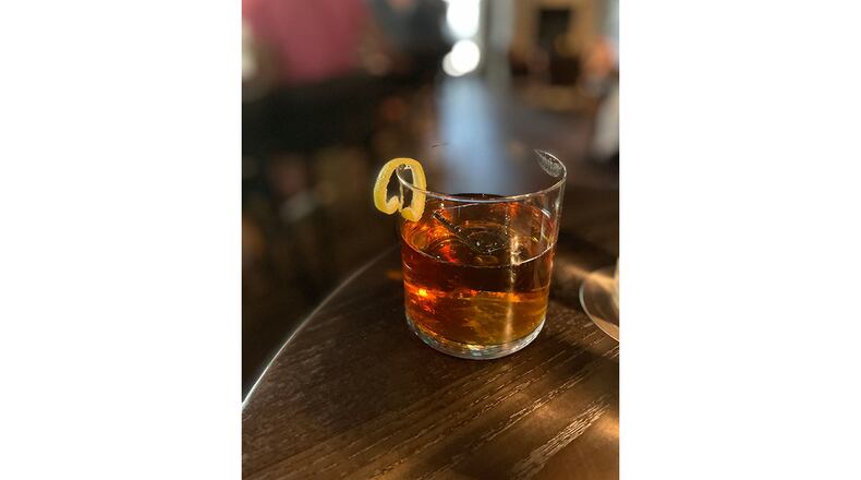 Swapping Nixta corn liqueur for sugar in an Old-Fashioned creates a savory cocktail. Angela Hansberger for The Atlanta Journal-Constitution