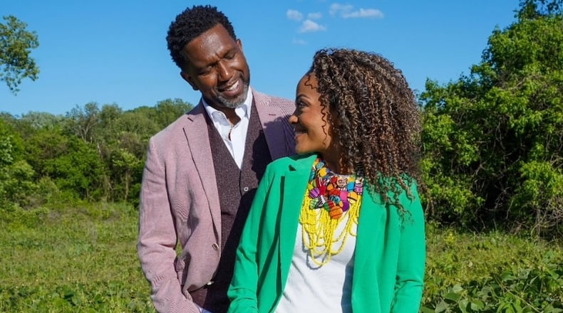 Keith Arthur Bolden, left, with Tinashe Kajese-Bolden.