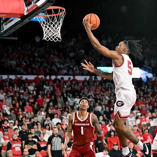 Georgia guard Jeremiah Wilkinson (5) goes in for a lay-up during the second half in an NCAA college basketball game at Stegeman Coliseum, Saturday, Jan. 17, 2026, in Athens. Georgia won 90-76 over Arkansas. (Hyosub Shin/AJC)