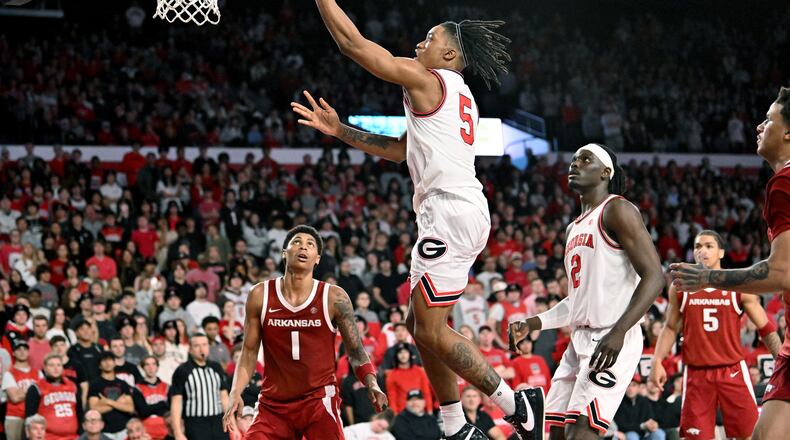 Georgia guard Jeremiah Wilkinson (5) goes in for a lay-up during the second half in an NCAA college basketball game at Stegeman Coliseum, Saturday, Jan. 17, 2026, in Athens. Georgia won 90-76 over Arkansas. (Hyosub Shin/AJC)