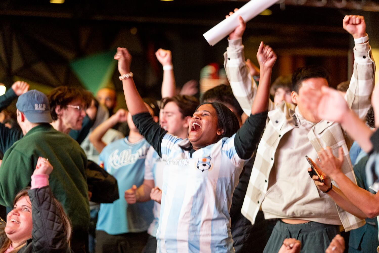Meena Jagdish celebrates during a World Cup watch party at the Roxy in Atlanta on Sunday, December 18, 2022.(Photo/Jenn Finch)