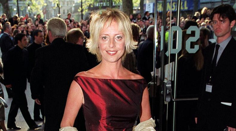 In this file photo dated April 27, 1999, British actress Emma Chambers on the des carpet in London. The actress, known for her roles in the TV series "The Vicar of Dibley" and the movie "Notting Hill," has died of natural causes at the age of 53, according to an announcement from her agent John Grant, on Saturday Feb. 24, 2018. (Peter Jordan/PA FILE via AP)
