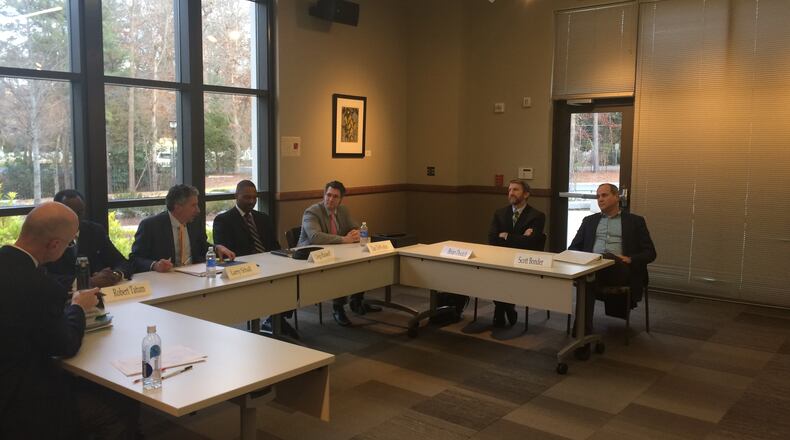 The new DeKalb County Board of Ethics met for the first time at Oglethorpe University on Wednesday. From left: Board attorney Gene Chapman and board members Robert Tatum, Larry Schall, Greg Russell, Dan DeWoskin, Brian Deutsch and Scott Bonder. MARK NIESSE / MARK.NIESSE@AJC.COM