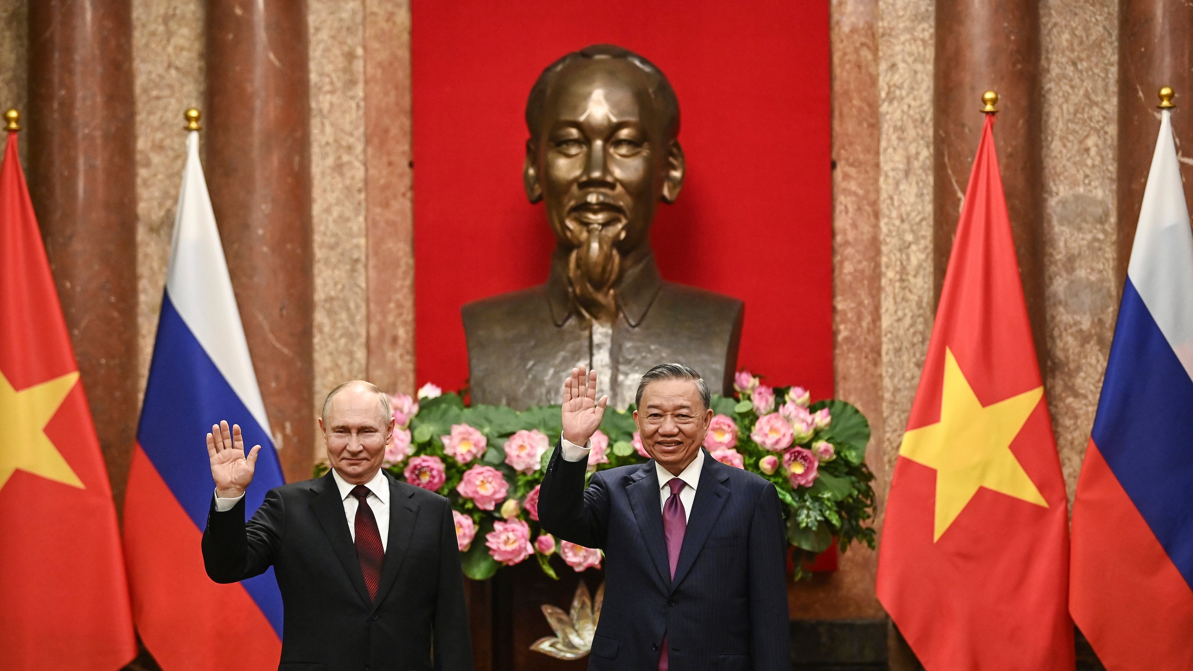 FILE - Russian President Vladimir Putin, left, and Vietnam's President To Lam pose for photos at the Presidential Palace in Hanoi, Vietnam on June 20, 2024. (Nhac Nguyen/Pool Photo via AP, File)