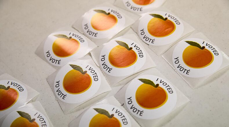 Stickers are displayed on a table during the Gwinnett County MARTA referendum special election at Harvest Community Church of the Nazarene in Lilburn, Tuesday, March 19, 2019. (ALYSSA POINTER/ALYSSA.POINTER@AJC.COM) AJC FILE PHOTO