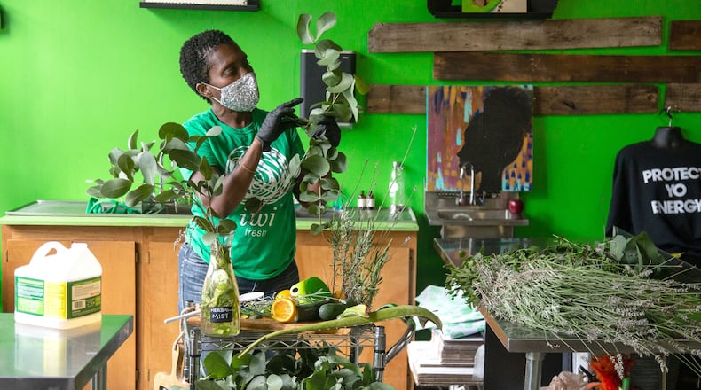 Owner of Iwi Fresh Farm-to-Skin Spa Yolanda Owens makes up a hydration face mist in her Atlanta spa Wednesday, July 01, 2020. STEVE SCHAEFER FOR THE ATLANTA JOURNAL-CONSTITUTION
