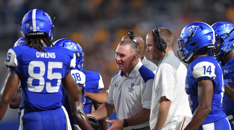 August 30, 2018 Atlanta - Georgia State head coach Shawn Elliott instructs Georgia State wide receiver Penny Hart (18)  in the first half of Georgia State season opening game against the Kennesaw State at Georgia State Stadium on Thursday, August 30, 2018. Georgia State won 24-20 over the Kennesaw State. HYOSUB SHIN / HSHIN@AJC.COM