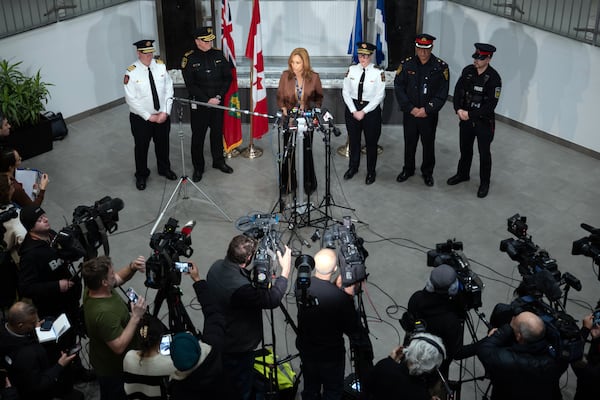 Deborah Ale Flint, the president and chief executive of the Greater Toronto Airports Authority, speaks at a news conference in Toronto after the plane crash.  (Ian Williams/The New York Times)                      