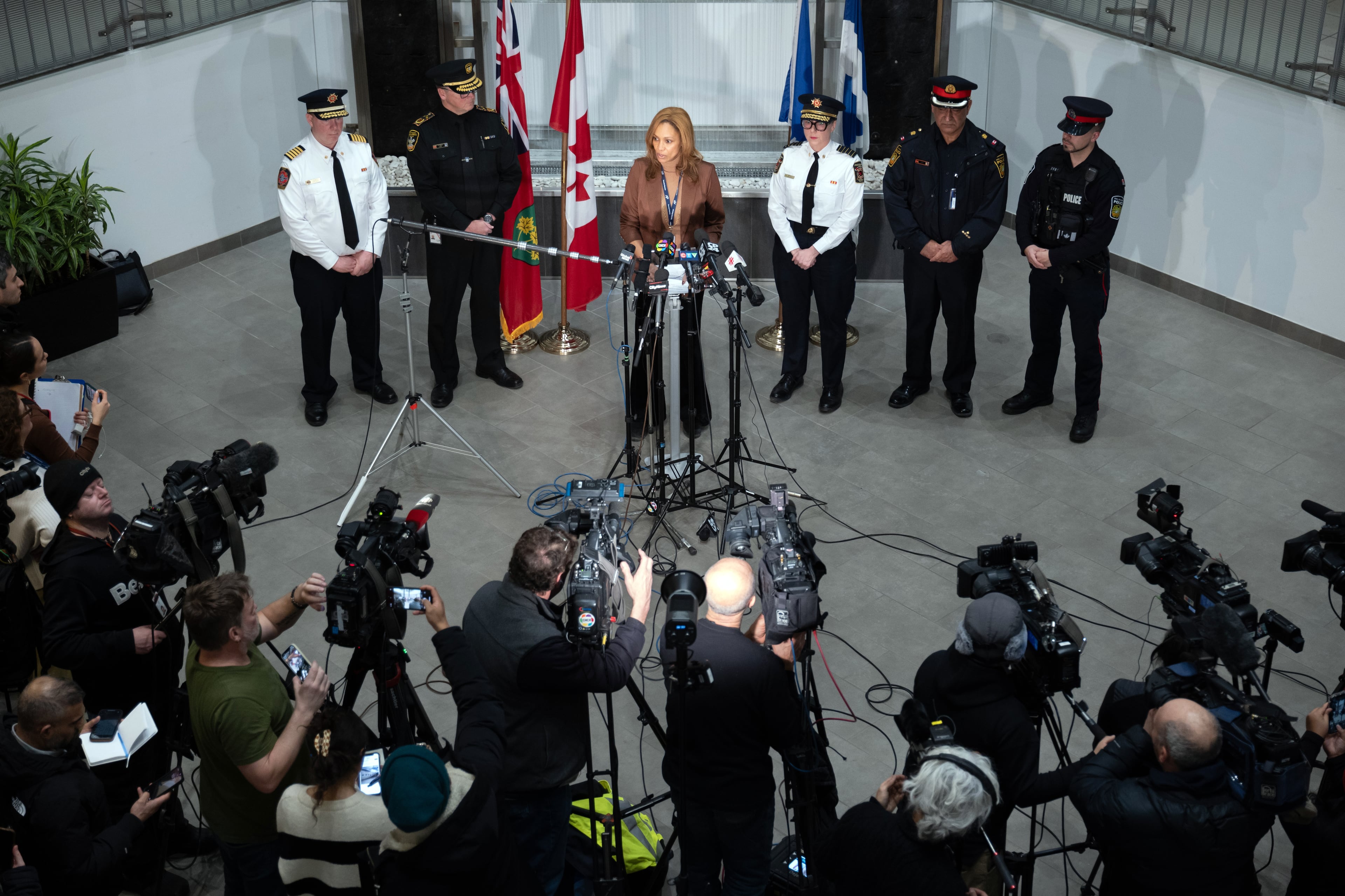 Deborah Ale Flint, the president and chief executive of the Greater Toronto Airports Authority, speaks at a news conference in Toronto after the plane crash. (Ian Williams/The New York Times)