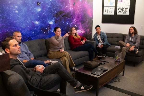 "Elio" Director Madeline Sharafian (center) gives feedback during an animation review with (left to right) Guillerme Jacinto, Brett Schulz, Jude Brownbill, Aaron Lo and Simon Christen at Pixar Animation Studios in Emeryville, California, 2023. (Deborah Coleman/Pixar)