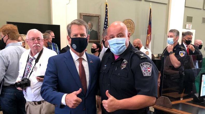 Gov. Brian Kemp and Fayetteville Police Chief Scott Gray were among the officials announcing a major gang-related investigation on Oct. 28. Courtesy City of Fayetteville