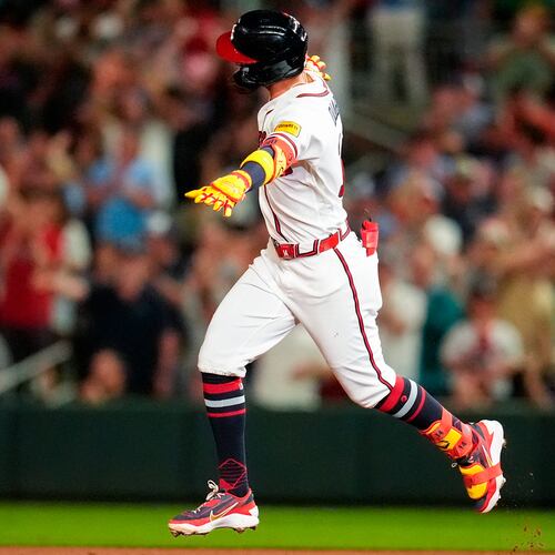 Atlanta Braves' Mauricio Dubón celebrates his two-run homer against the Chicago Cubs on May 13, 2026. (Mike Stewart/AP)