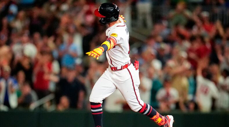 Atlanta Braves' Mauricio Dubón celebrates his two-run homer against the Chicago Cubs on May 13, 2026. (Mike Stewart/AP)