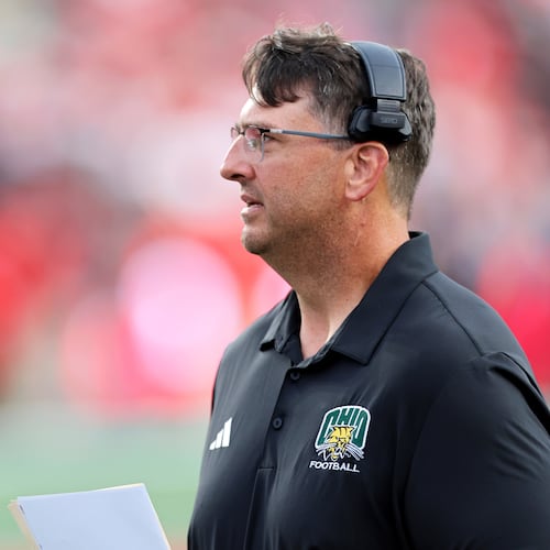 FILE - Ohio's head coach Brian Smith watches during an NCAA football game against Rutgers, Aug. 28, 2025, in Piscataway, N.J. (AP Photo/Gregory Payan, File)