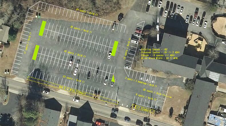 Woodstock’s primary downtown parking lot will be repaired, resurfaced and given such amenities as new lighting, sidewalks and planters as part of a $260,000 renovation. CITY OF WOODSTOCK