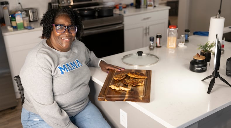 Sonja Collins poses for a photograph in one of the two locations where she records her social media features in Fortson on January 9, 2024.   (Steve Schaefer/steve.schaefer@ajc.com)