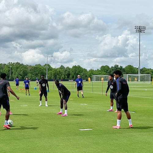 United States soccer players work on a drill at the new national training complex, Thursday, May 28, 2026, in Fayetteville, Ga., ahead of the 2026 World Cup soccer tournament. (AP Photo/Ronald Blum