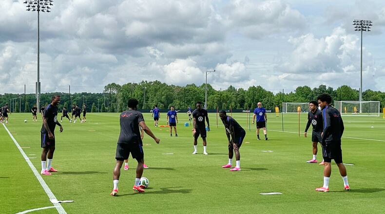 United States soccer players work on a drill at the new national training complex, Thursday, May 28, 2026, in Fayetteville, Ga., ahead of the 2026 World Cup soccer tournament. (AP Photo/Ronald Blum